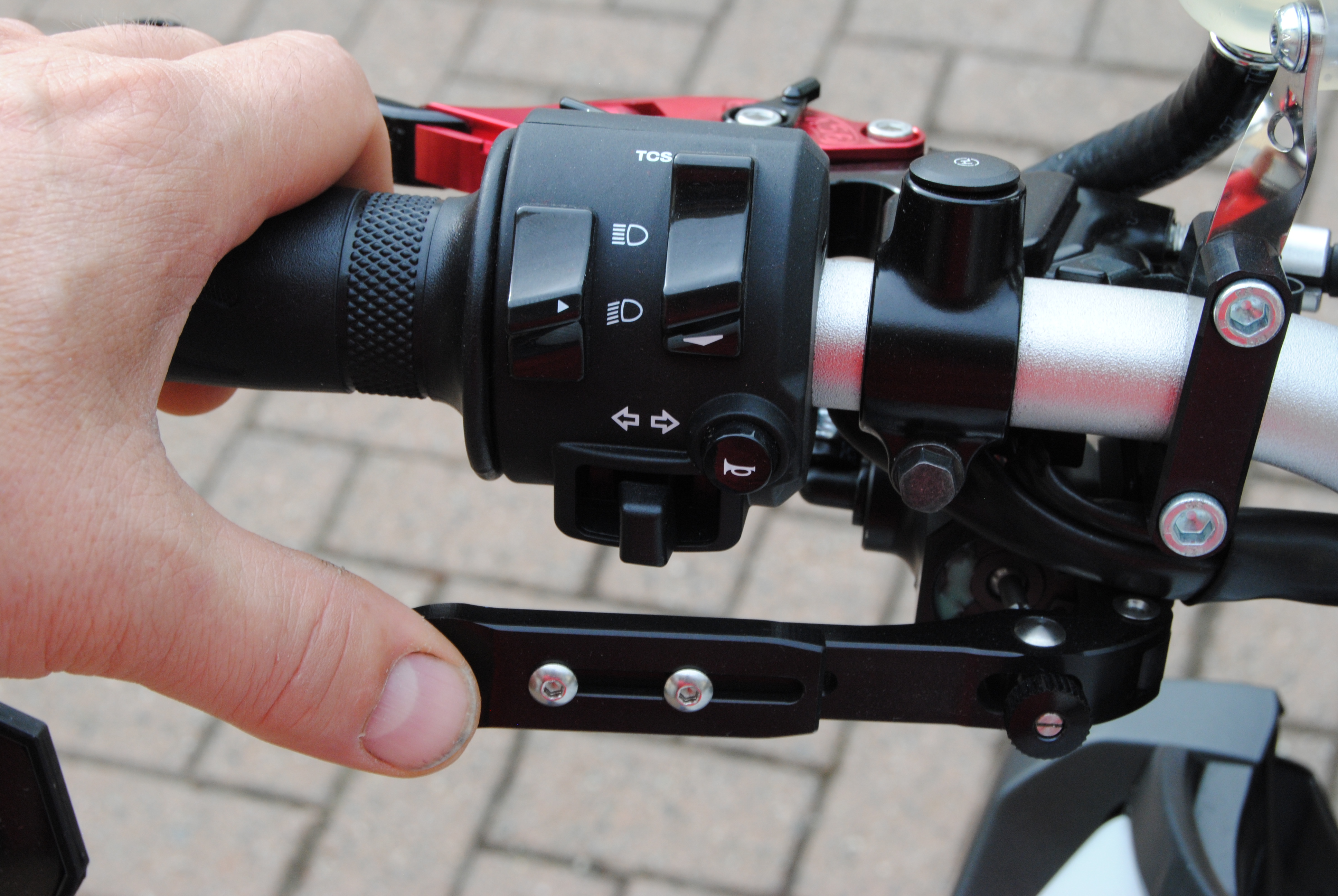 Freno posteriore a pollice