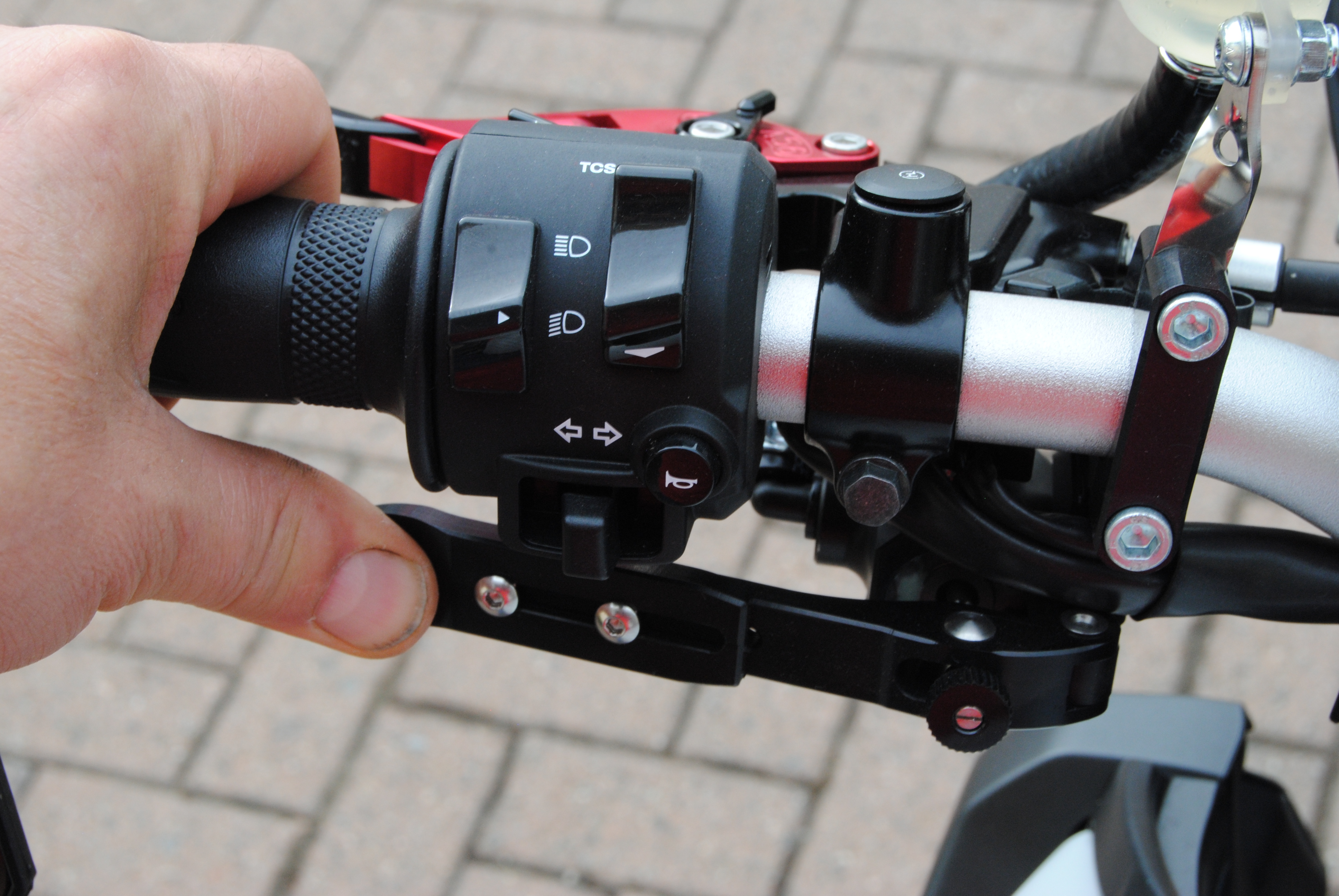 Freno posteriore a pollice