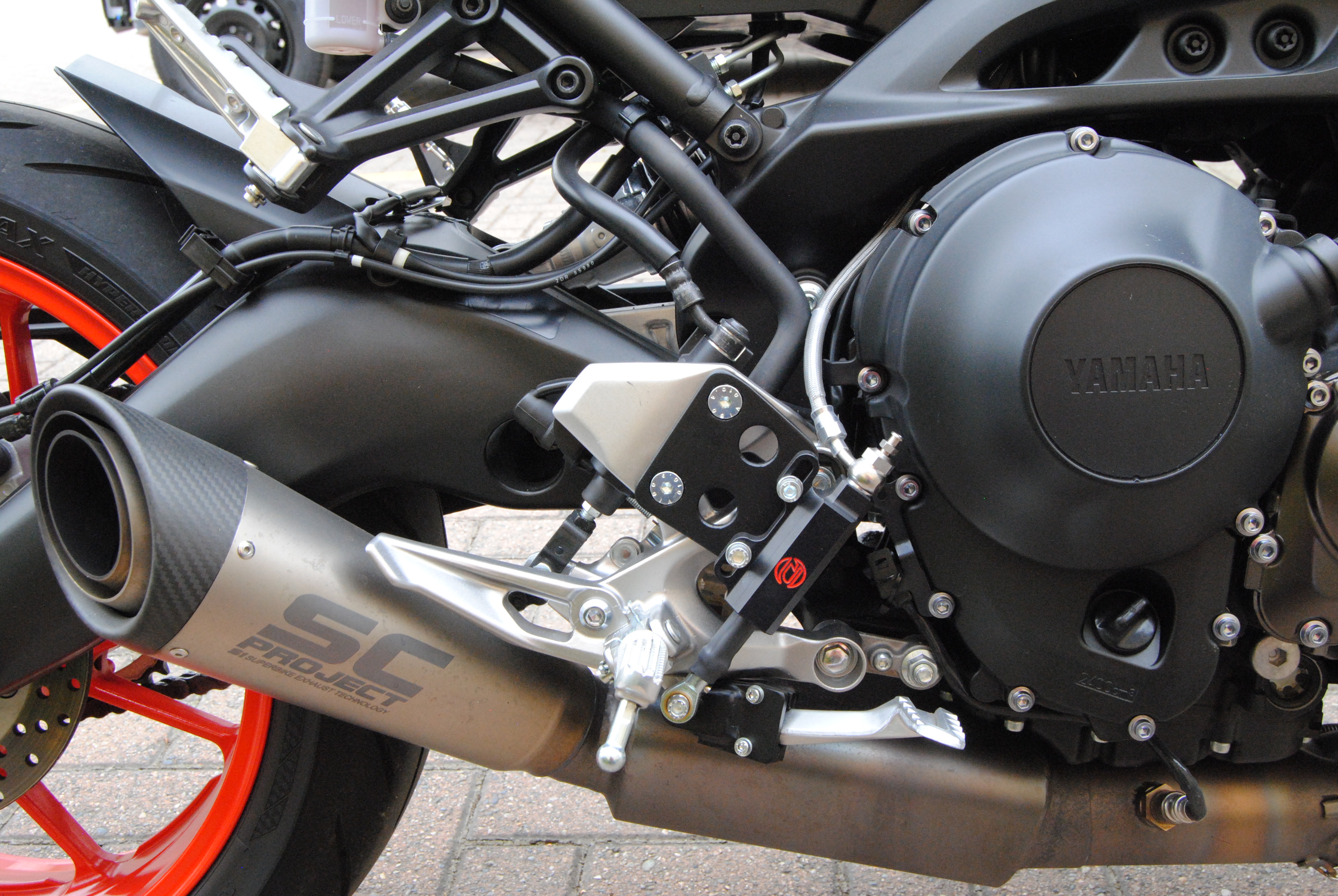 Freno posteriore a pollice