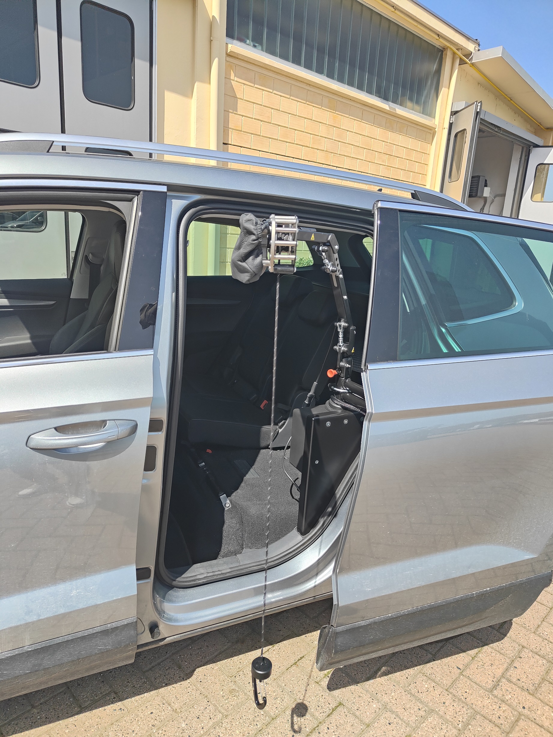 Verricello solleva carrozzina